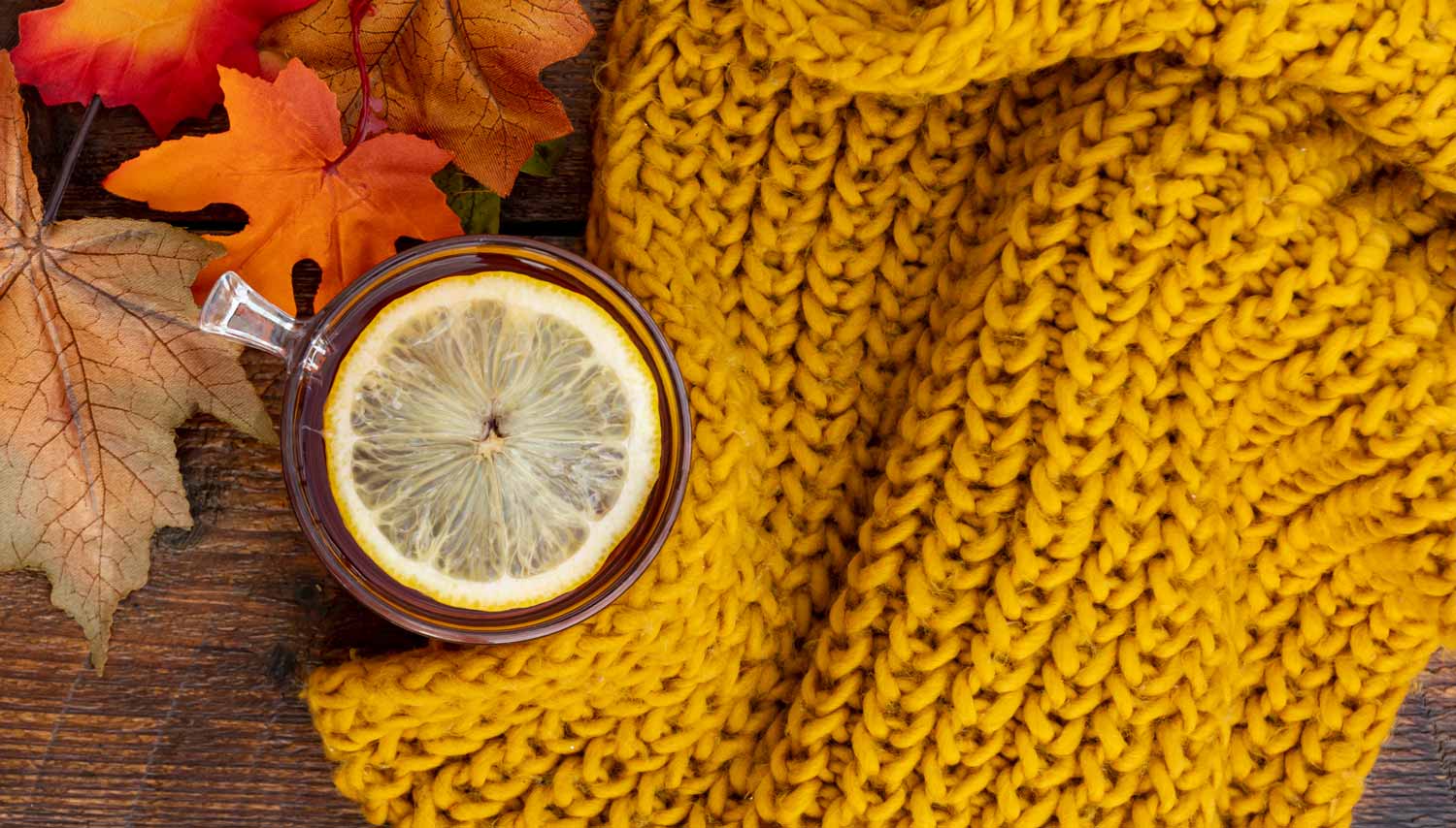 A scarf and a hot lemon